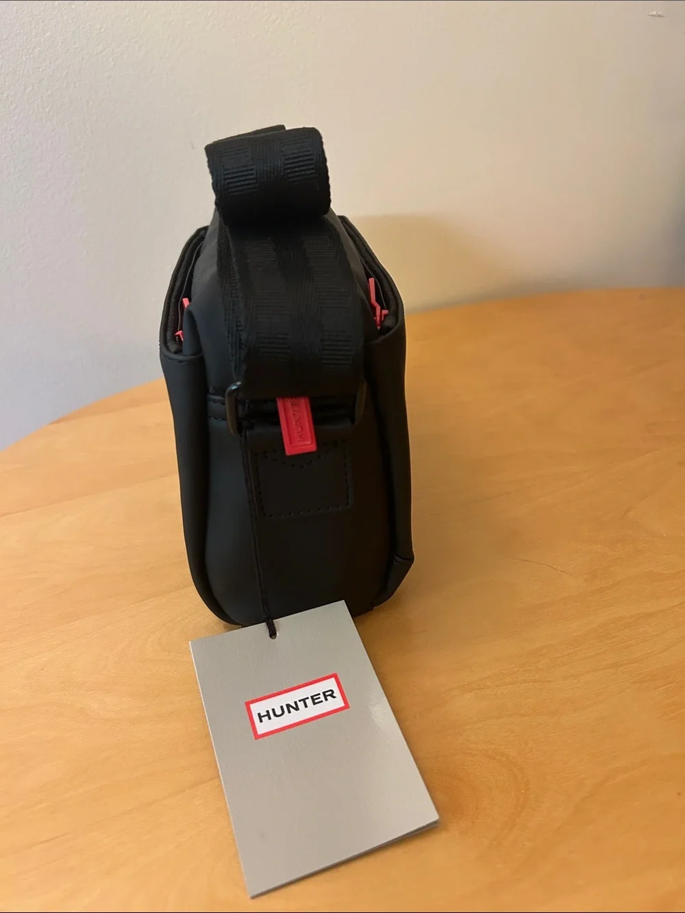 Hunter Black Crossbody Messenger Bag with Red Logo Accents